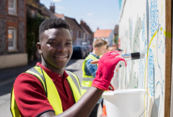 boy painting wall